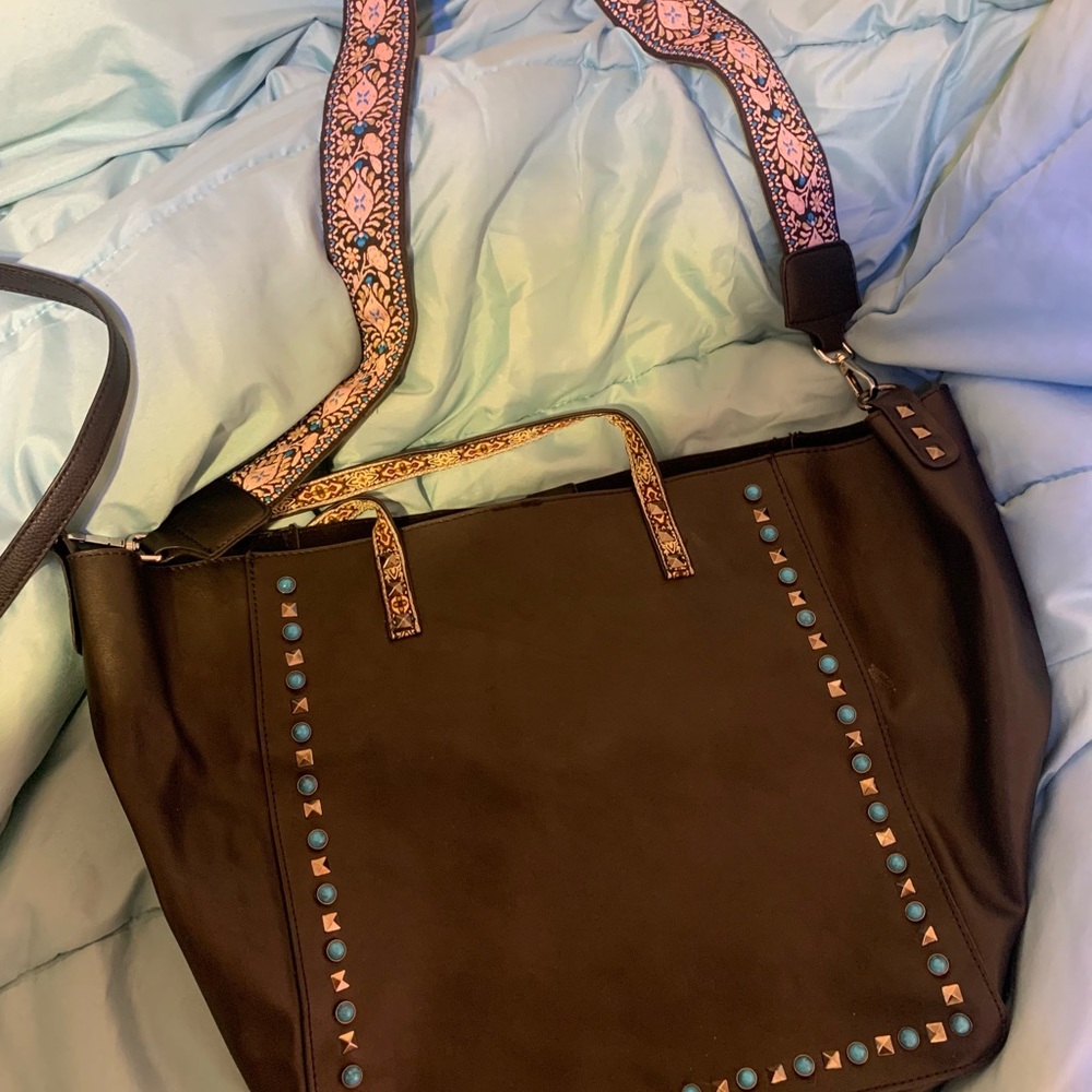 Large Black Purse w/ guitar strap. Never been used